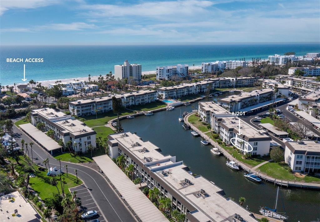 4400 Exeter Drive, Unit J201 Longboat Key, FL 34228 - Photo 1 of 1 a view of a city with tall buildings
