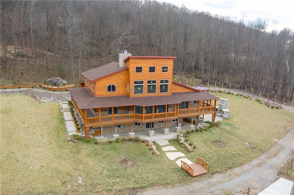 337 Chestnut Ridge Road Latrobe, PA 15650 - Photo 1 of 25 view of a pool with a yard