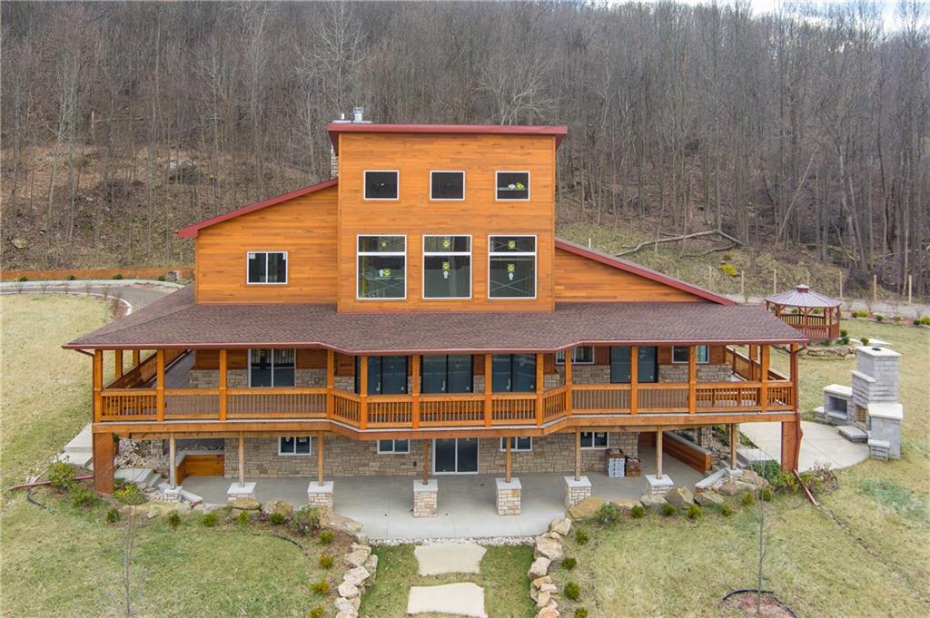 337 Chestnut Ridge Road Latrobe, PA 15650 - Photo 2 of 25 a front view of a house with a yard