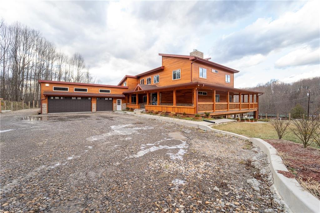 337 Chestnut Ridge Road Latrobe, PA 15650 - Photo 25 of 25 a view of a house next to a big yard