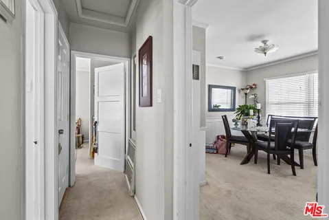 a view of a livingroom with furniture and window