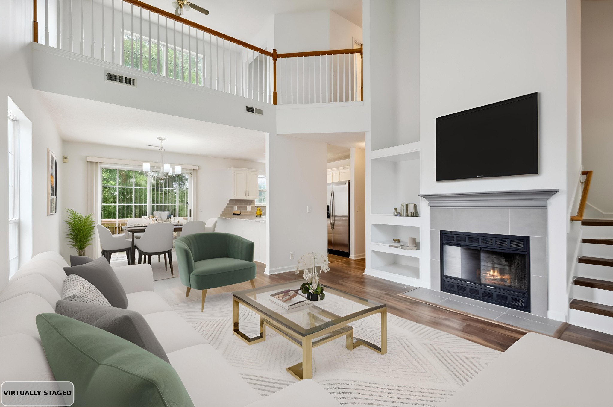 a living room with furniture a flat screen tv and a fireplace