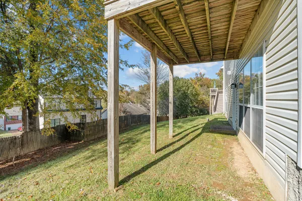 a bathroom with a shower and a bath tub