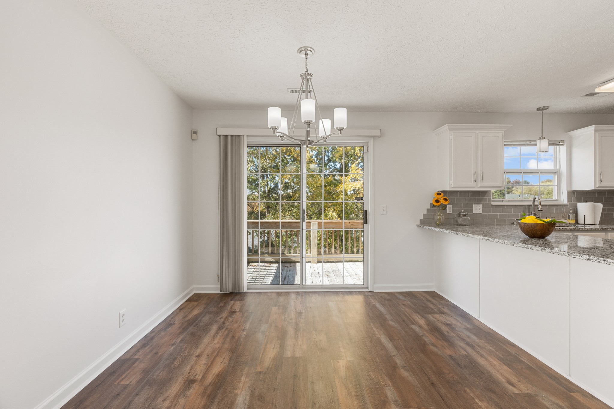 1068 Tulip Grove Road Hermitage, TN 37076 - Photo 31 of 100 a view of an empty room with window and wooden floor
