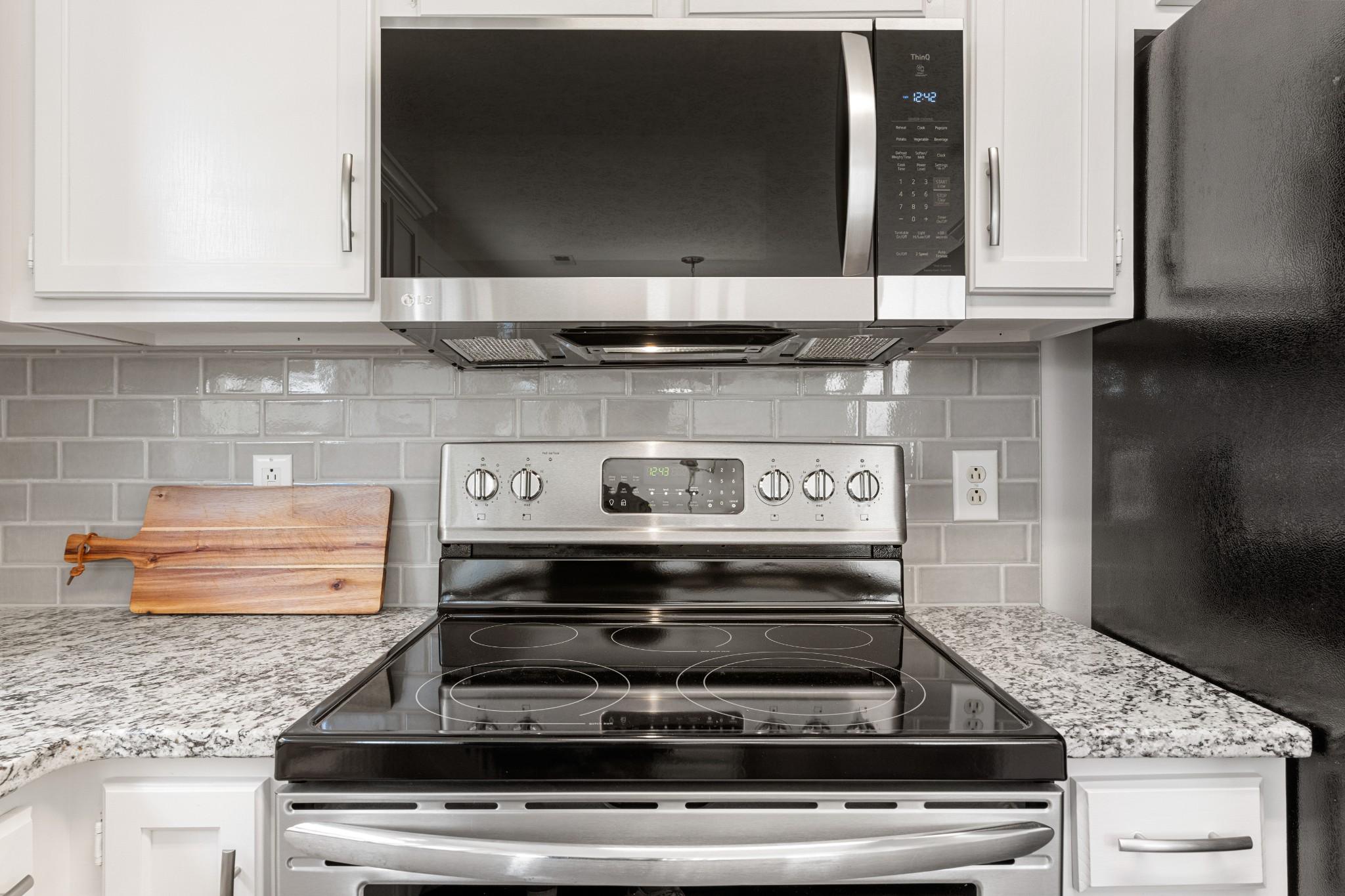 1068 Tulip Grove Road Hermitage, TN 37076 - Photo 40 of 100 a stove top oven sitting inside of a kitchen