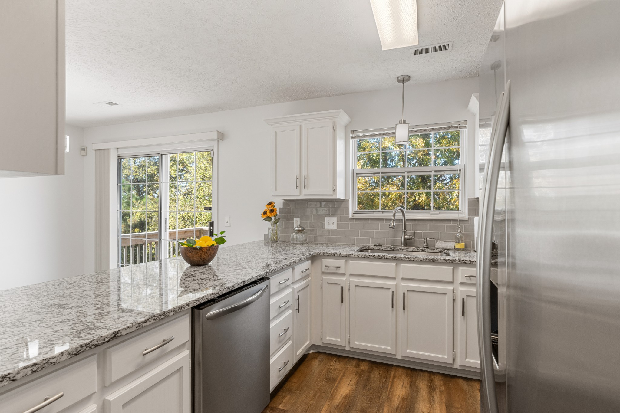 1068 Tulip Grove Road Hermitage, TN 37076 - Photo 44 of 100 a kitchen with a sink appliances cabinets and a window