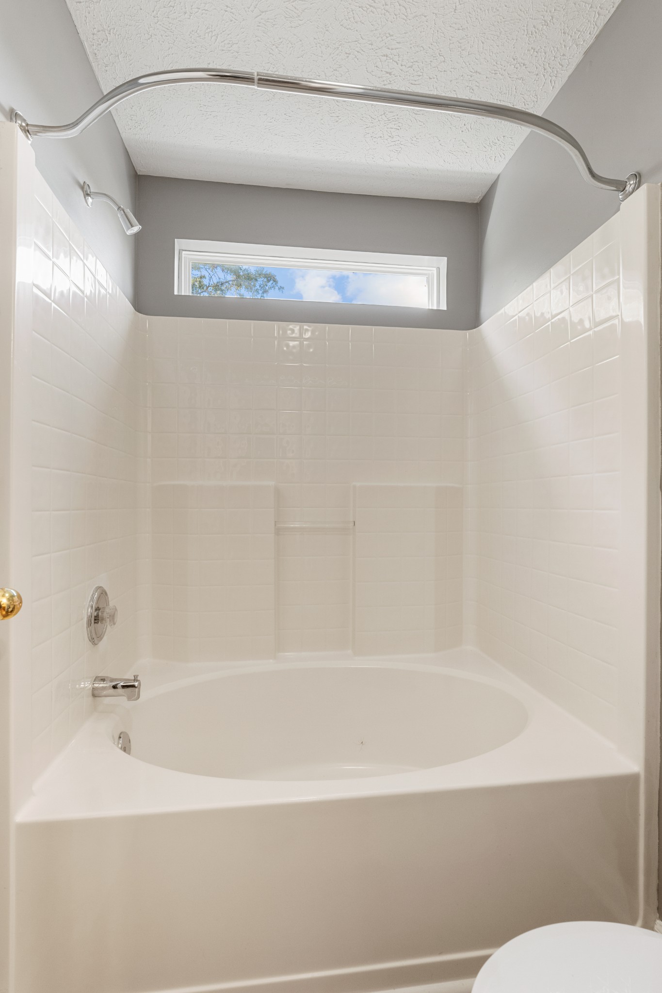 1068 Tulip Grove Road Hermitage, TN 37076 - Photo 50 of 100 a bathroom with a shower and a bath tub