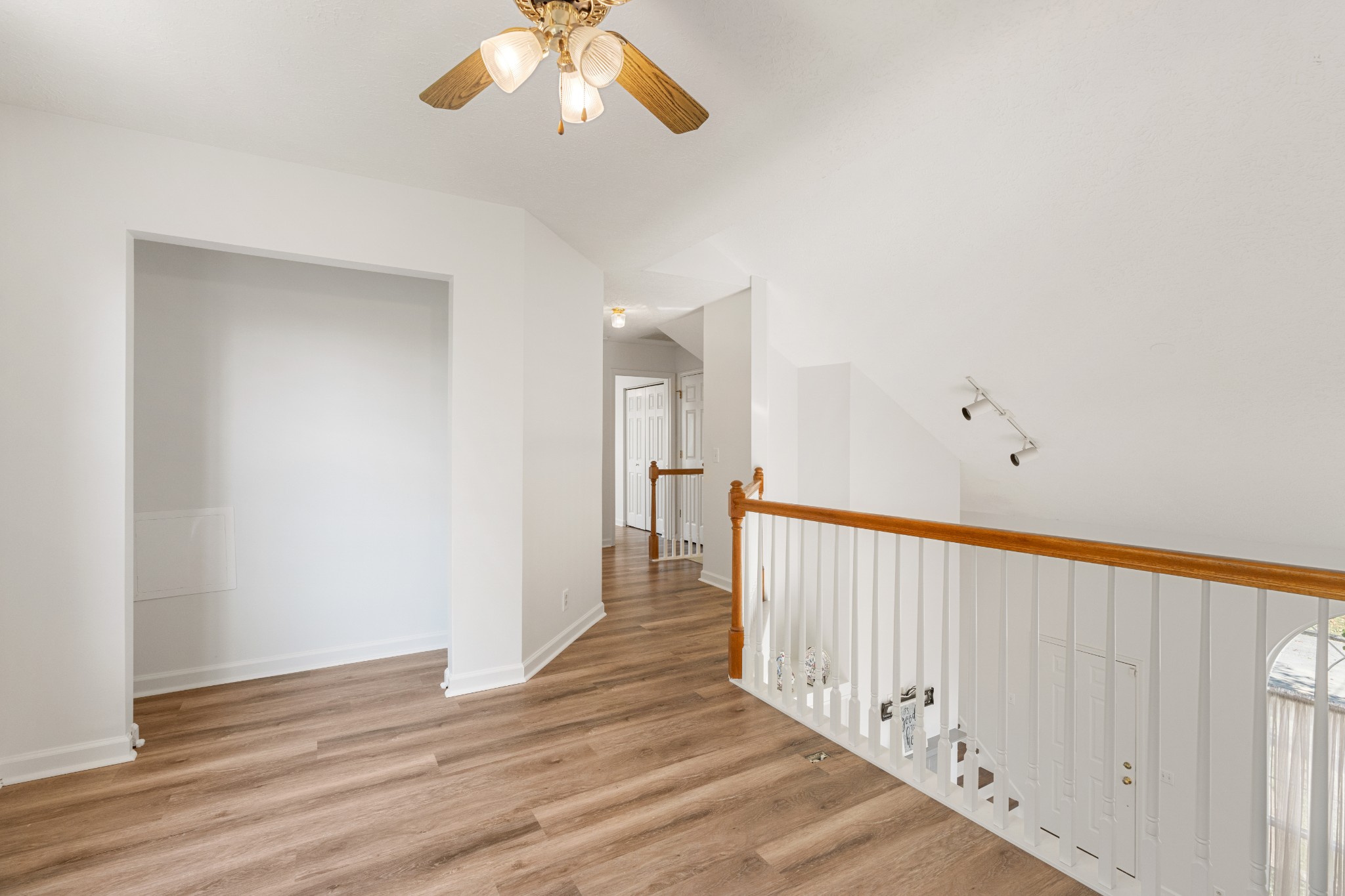 1068 Tulip Grove Road Hermitage, TN 37076 - Photo 52 of 100 a view of a hallway with wooden floor