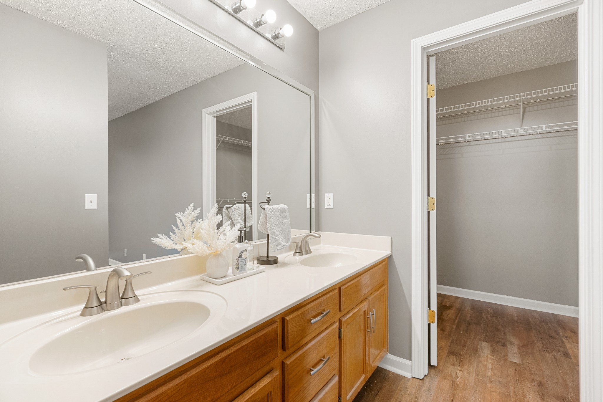 1068 Tulip Grove Road Hermitage, TN 37076 - Photo 60 of 100 a bathroom with a sink double vanity and a mirror