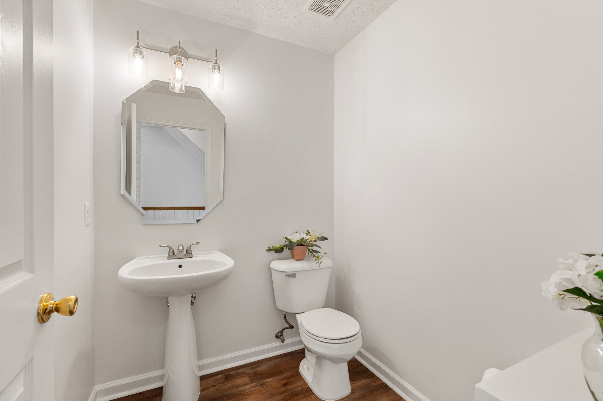 1068 Tulip Grove Road Hermitage, TN 37076 - Photo 65 of 100 a bathroom with a sink toilet and mirror