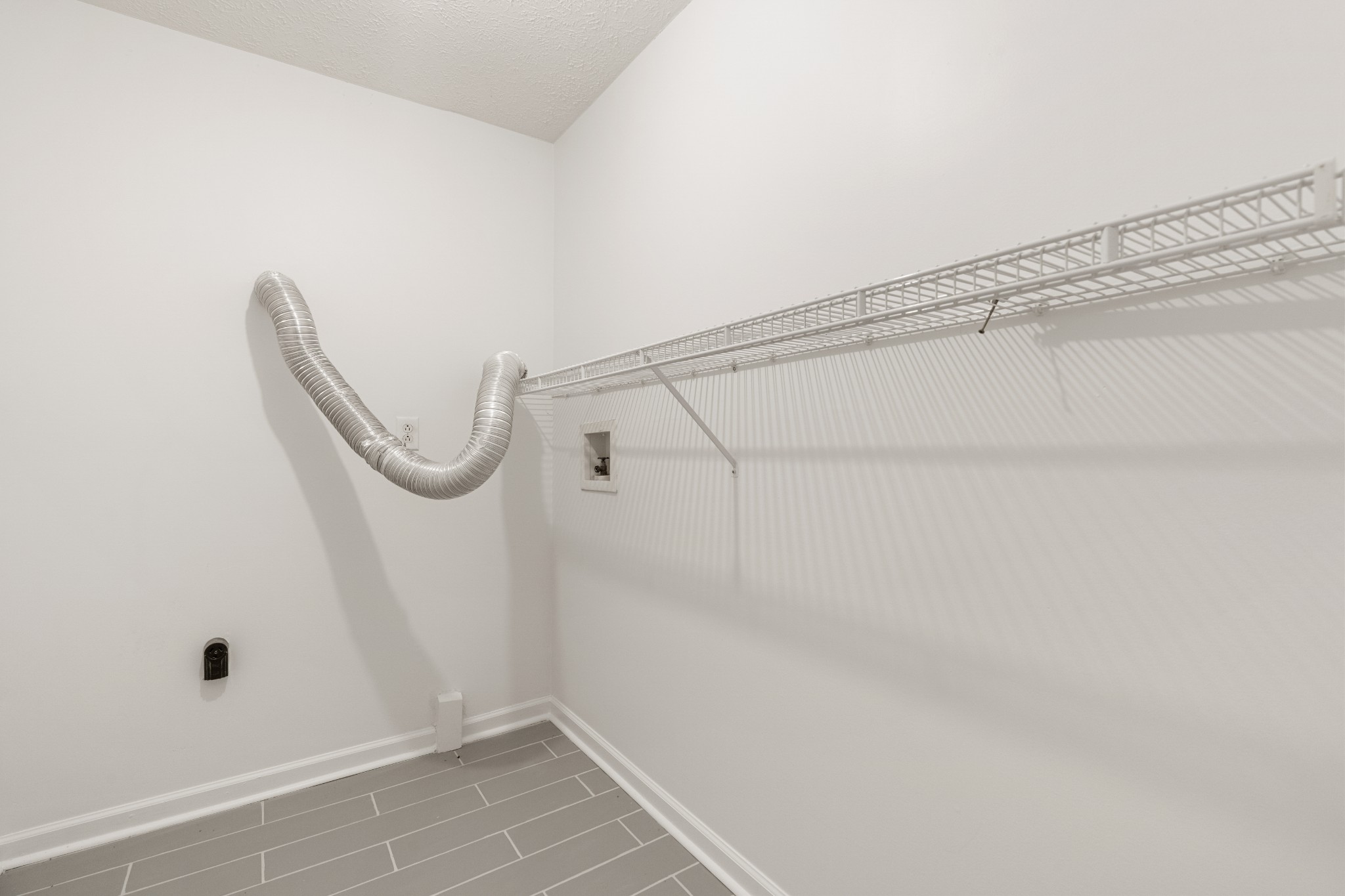 1068 Tulip Grove Road Hermitage, TN 37076 - Photo 75 of 100 a view of a room with racks on the wall