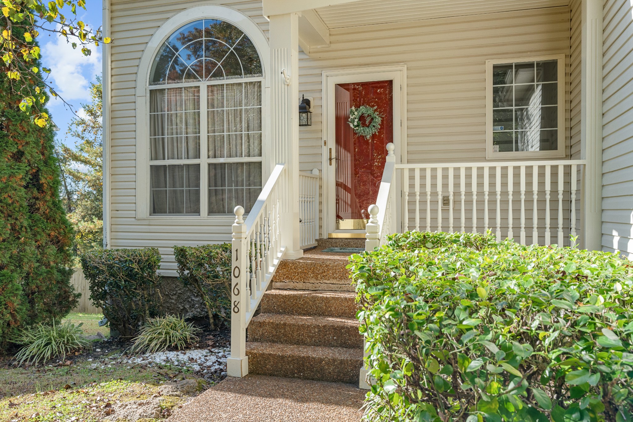 1068 Tulip Grove Road Hermitage, TN 37076 - Photo 8 of 100 a front view of a house with a garden