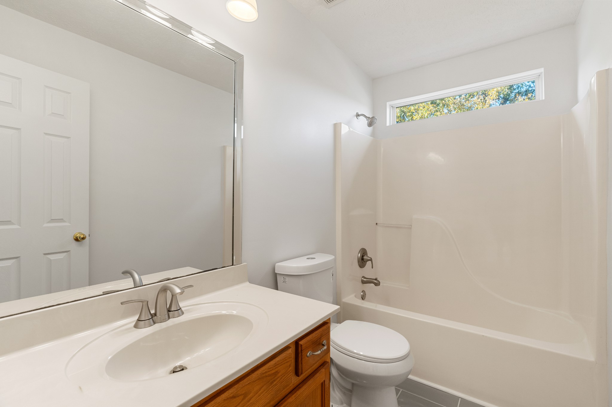 1068 Tulip Grove Road Hermitage, TN 37076 - Photo 85 of 100 a bathroom with a sink a toilet and shower