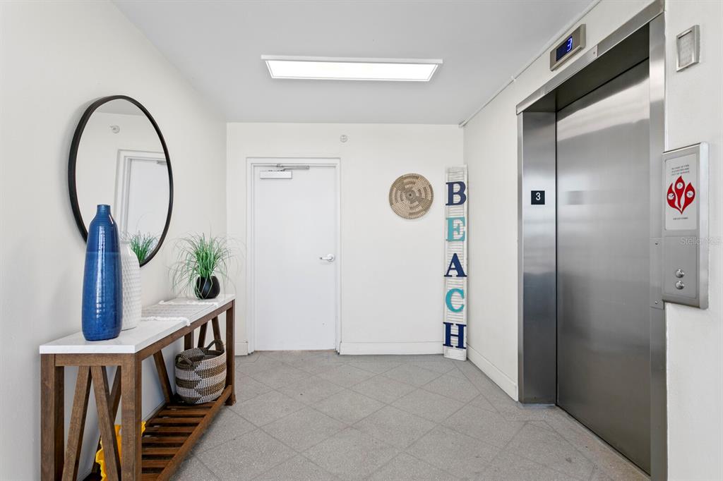 16332 Gulf Boulevard, Unit 3B Redington Beach, FL 33708 - Photo 7 of 91 a view of a hallway with entryway