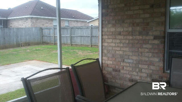 8451 Kendall Court Mobile, AL 36695 - Photo 24 of 33 Nice size screen porch.