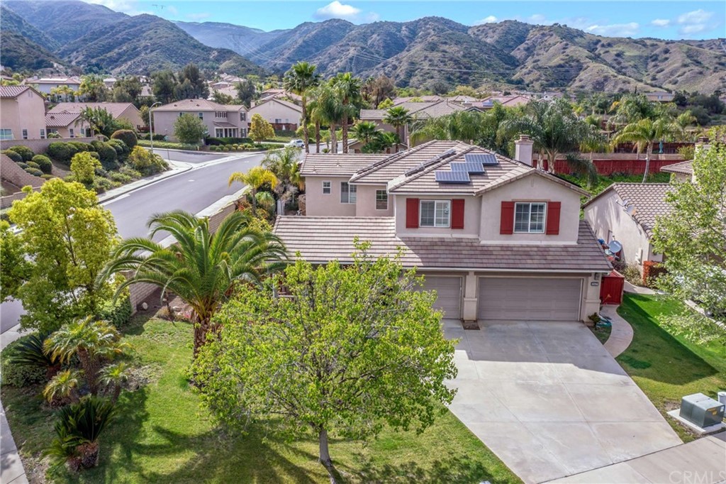 23537 Cantara Road Corona, CA 92883 - Photo 2 of 60 an aerial view of a house with a garden
