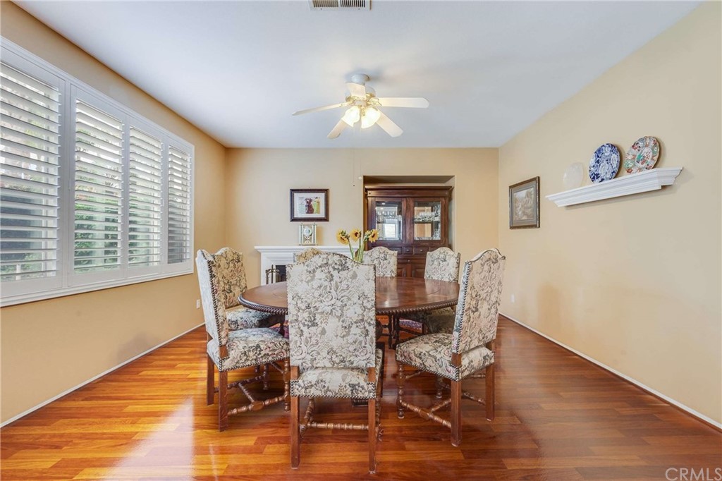 23537 Cantara Road Corona, CA 92883 - Photo 26 of 60 a dining room with furniture and window