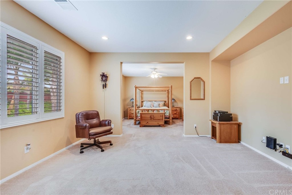 23537 Cantara Road Corona, CA 92883 - Photo 35 of 60 a room with furniture