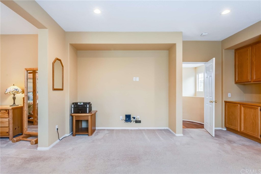 23537 Cantara Road Corona, CA 92883 - Photo 38 of 60 a view of an empty room with closet and workspace