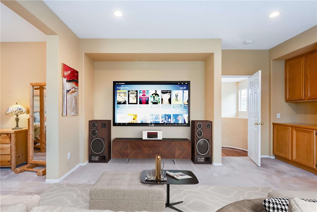 23537 Cantara Road Corona, CA 92883 - Photo 39 of 60 a view of a livingroom with workspace and a couch