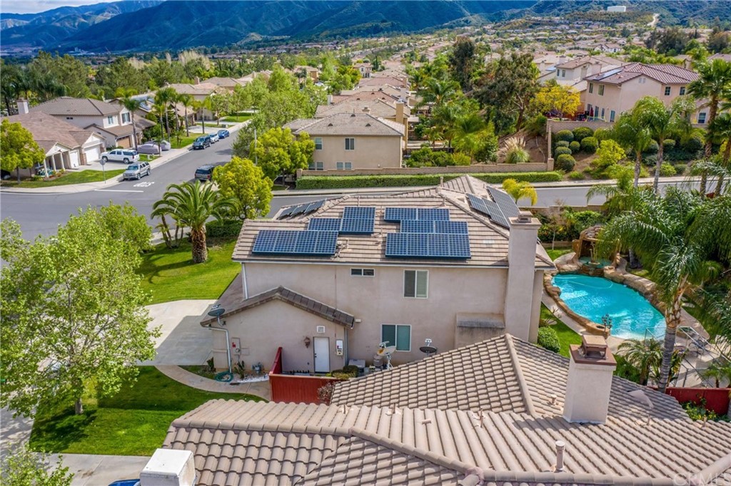 23537 Cantara Road Corona, CA 92883 - Photo 4 of 60 an aerial view of a house with garden space and street view