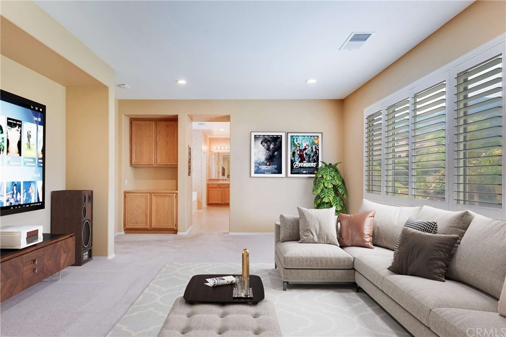 23537 Cantara Road Corona, CA 92883 - Photo 41 of 60 a living room with furniture and a couch