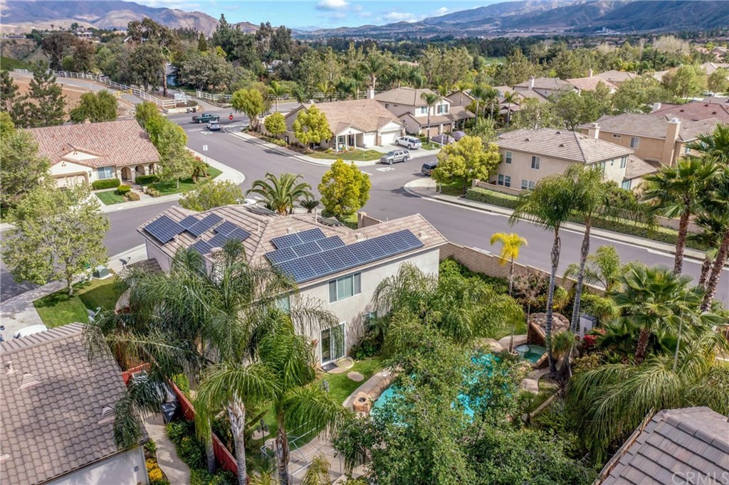 23537 Cantara Road Corona, CA 92883 - Photo 5 of 60 an aerial view of residential houses with outdoor space and street view