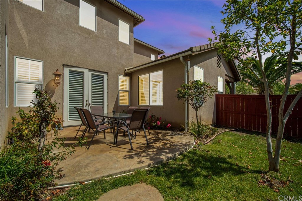 23537 Cantara Road Corona, CA 92883 - Photo 59 of 60 a view of a house with backyard and sitting area