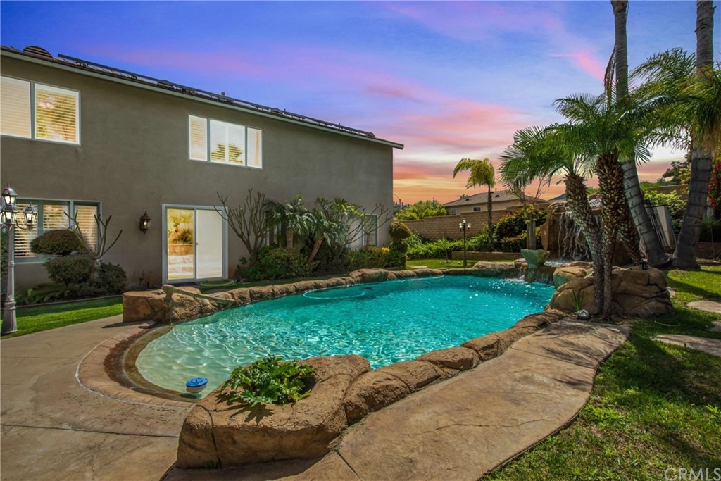 23537 Cantara Road Corona, CA 92883 - Photo 60 of 60 a front view of a house with a yard