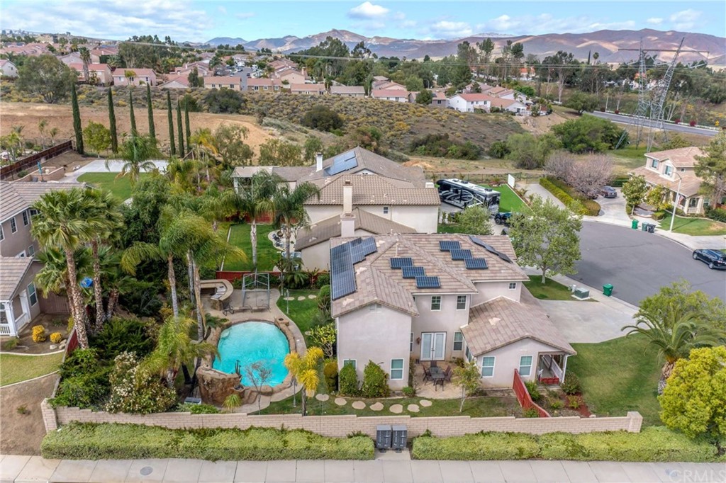 23537 Cantara Road Corona, CA 92883 - Photo 6 of 60 an aerial view of residential houses with outdoor space and swimming pool