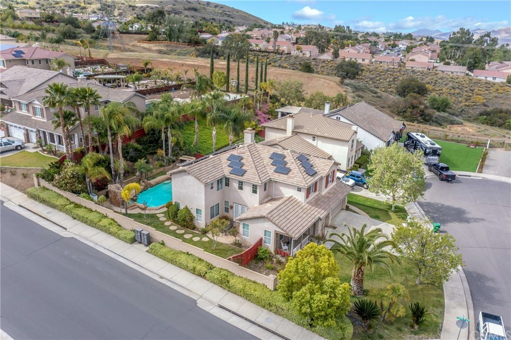 23537 Cantara Road Corona, CA 92883 - Photo 7 of 60 an aerial view of a house with a lake view
