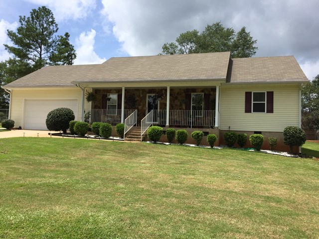 513 Music Row, Unit 9 Forsyth, GA 31029 - Photo 1 of 19 a view of a house with backyard and garden