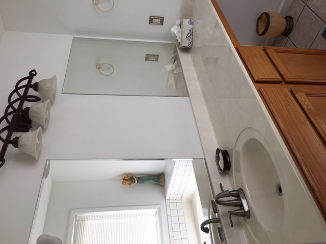 513 Music Row, Unit 9 Forsyth, GA 31029 - Photo 12 of 19 walk in closet with wooden floor washer and dryer