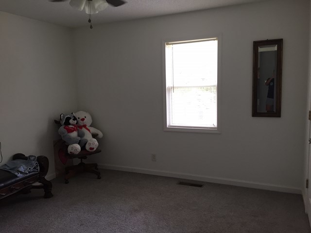 513 Music Row, Unit 9 Forsyth, GA 31029 - Photo 15 of 19 a room with toys and a window