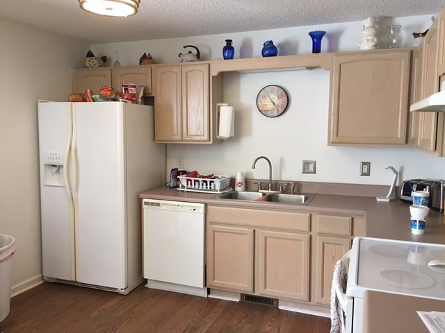 513 Music Row, Unit 9 Forsyth, GA 31029 - Photo 16 of 19 a kitchen with stainless steel appliances granite countertop a refrigerator and a sink