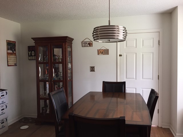 513 Music Row, Unit 9 Forsyth, GA 31029 - Photo 4 of 19 a view of a dining room with furniture