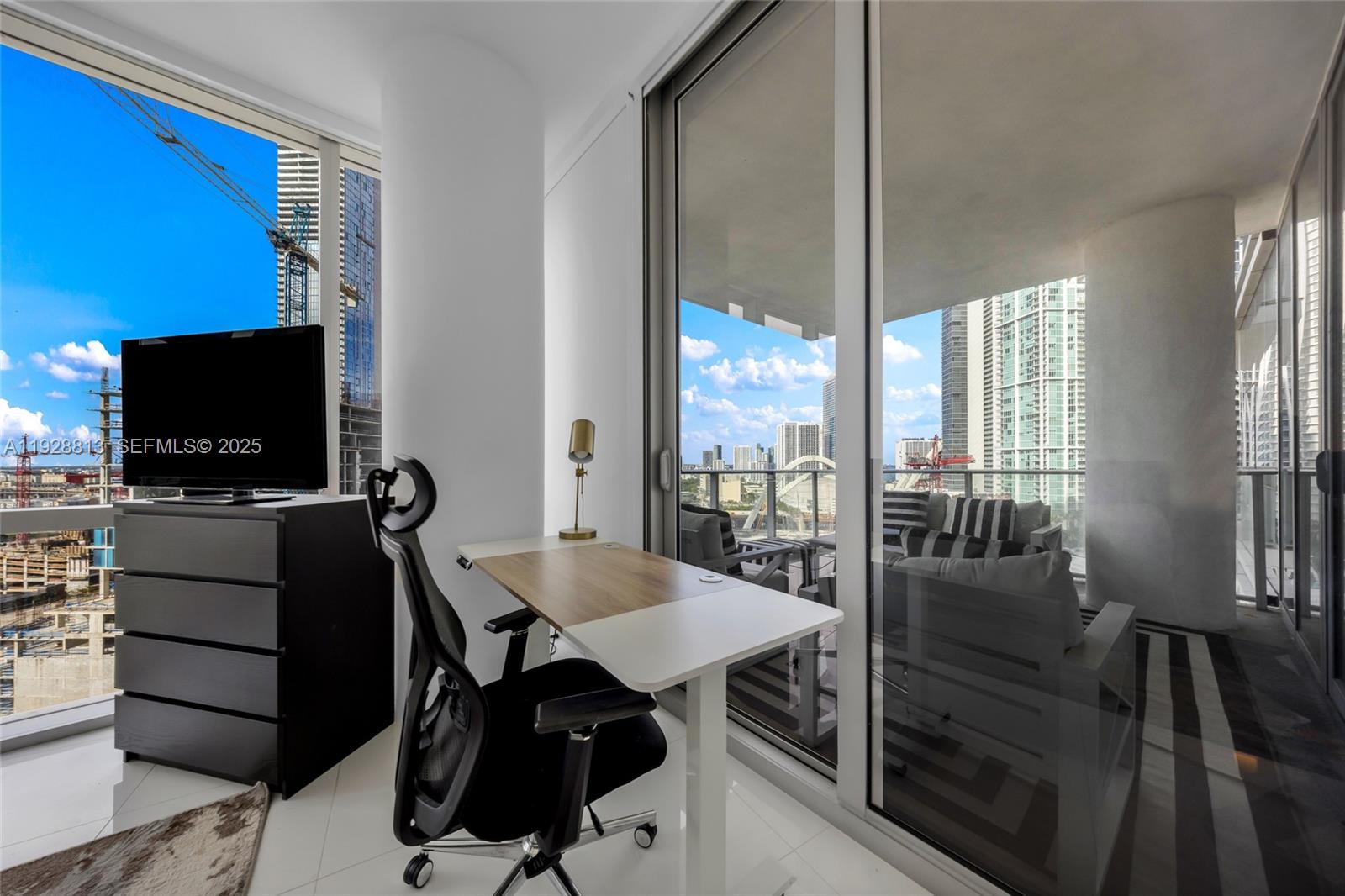 851 Northeast 1st Avenue, Unit 1700 Miami, FL 33132 - Photo 22 of 30 a view of a livingroom with furniture