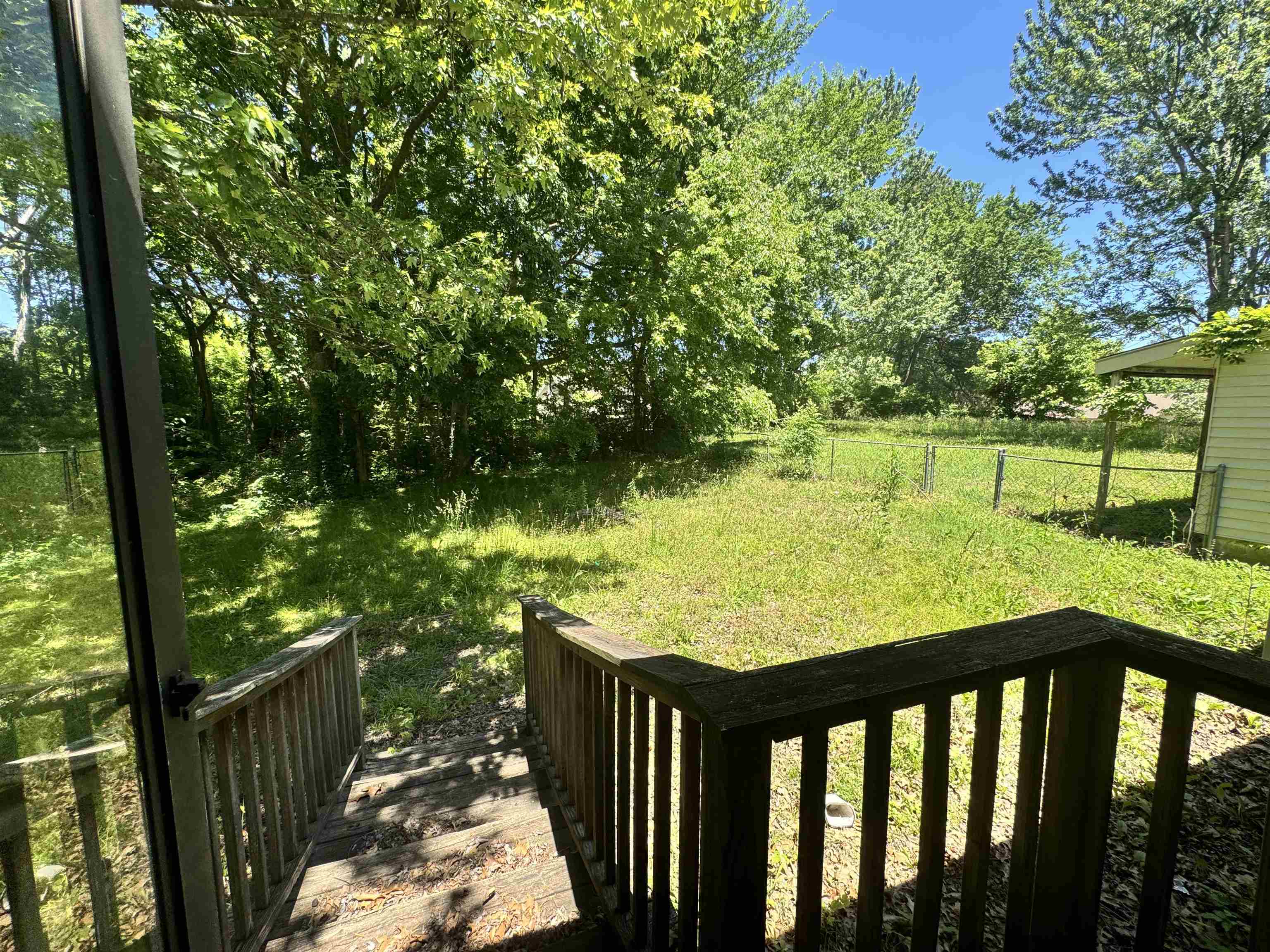 4712 Drummonds Road Drummonds, TN 38023 - Photo 32 of 38 Expansive green space with perimeter fencing and mature trees