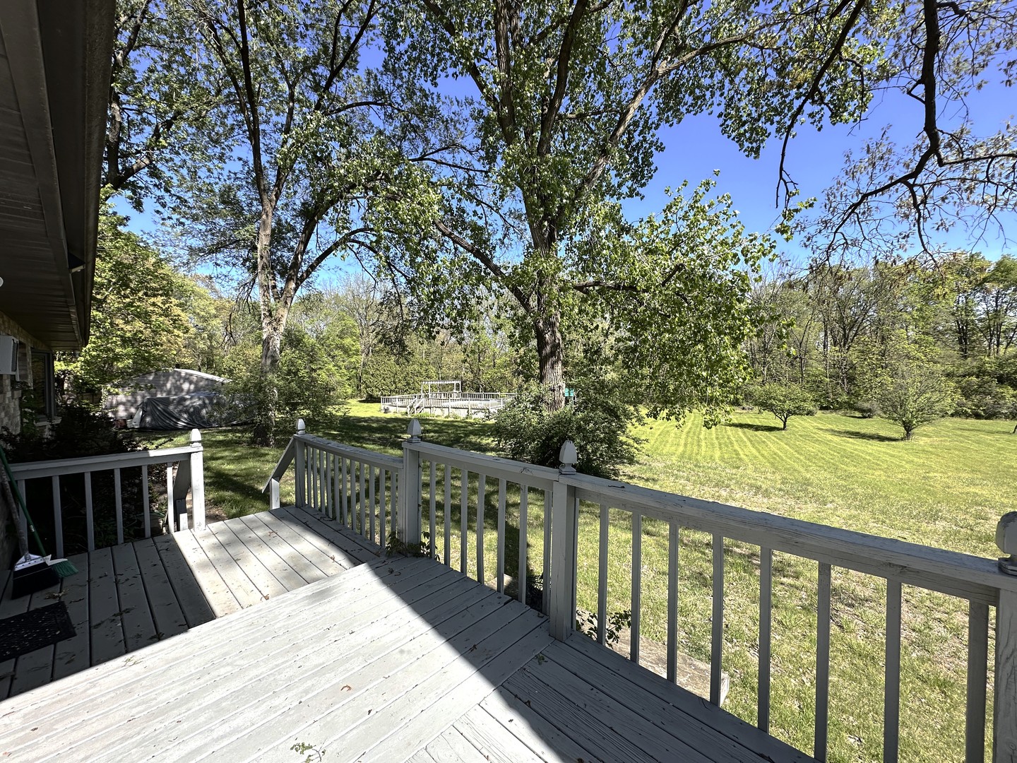 35110 South Rivals Road Wilmington, IL 60481 - Photo 44 of 47 a view of a balcony with wooden floor and fence