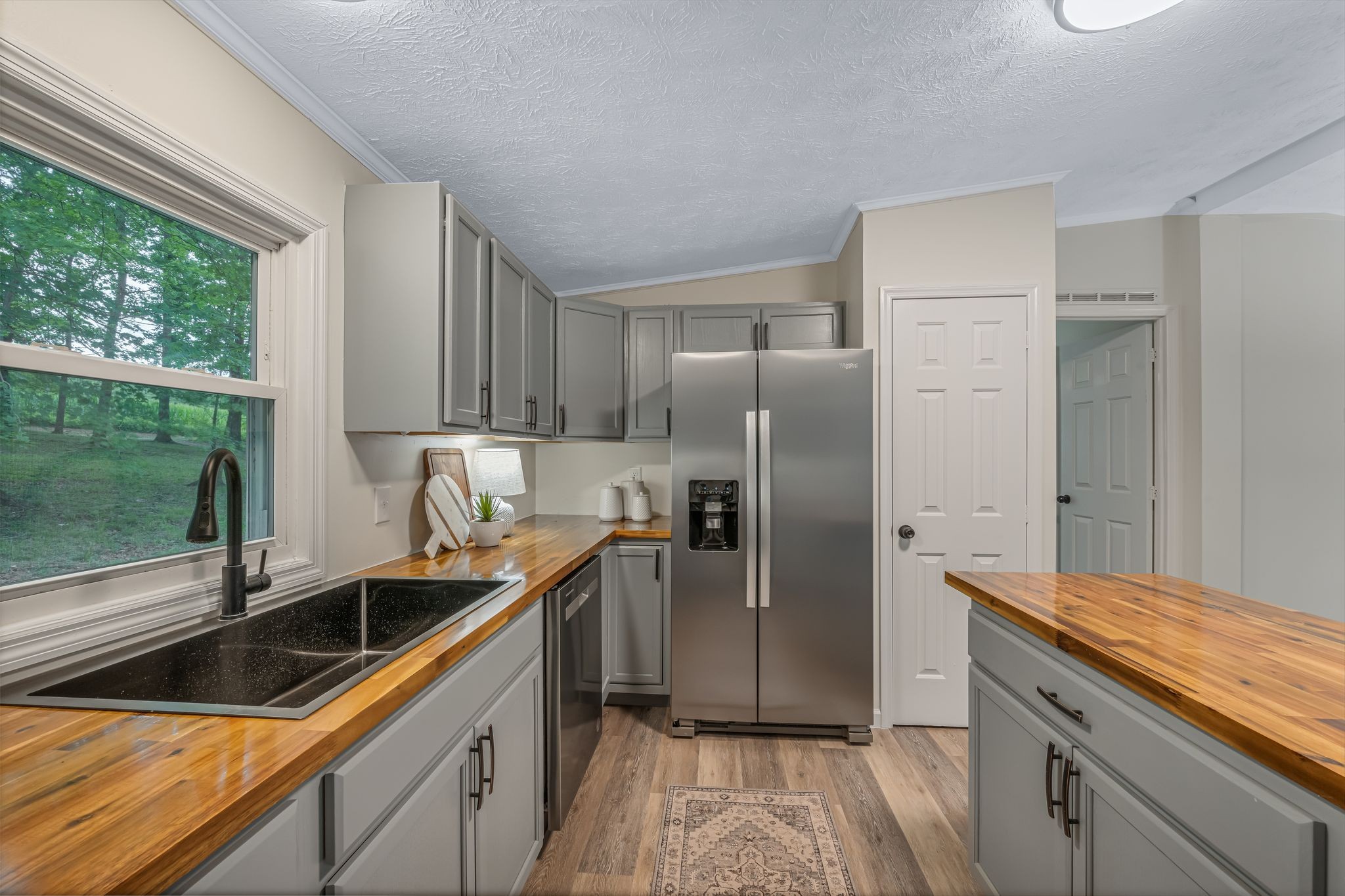 840 Promise Land Road Charlotte, TN 37036 - Photo 11 of 38 NEW Stainless Steel Appliance Package including Side by Side Refrigerator
