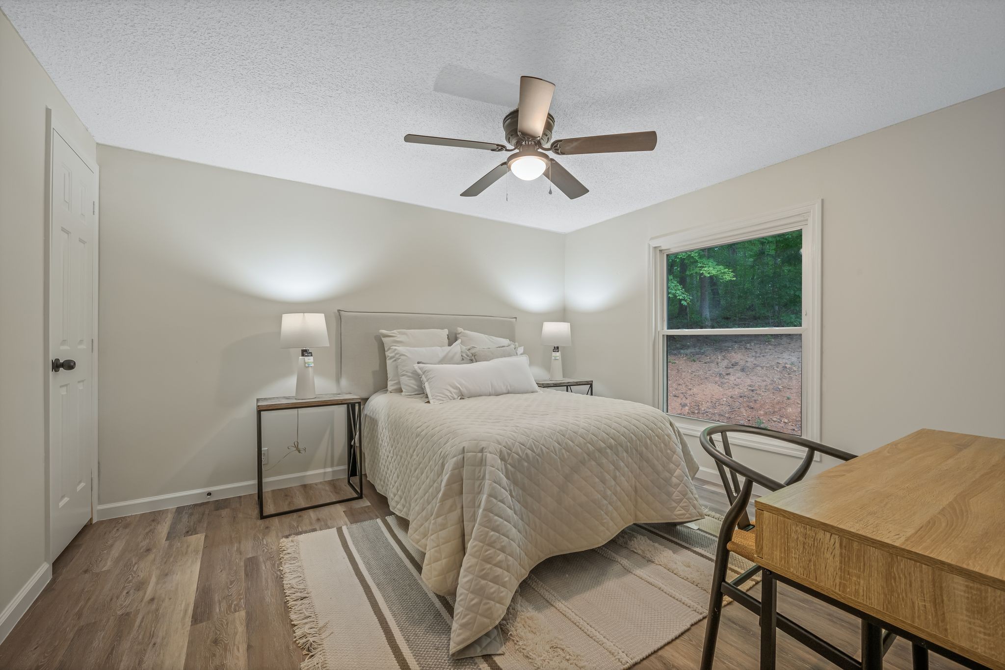 840 Promise Land Road Charlotte, TN 37036 - Photo 21 of 38 SPACIOUS Guest Bedrooms w/ UPGRADED Wide Plank Flooring + New Ceiling Fan