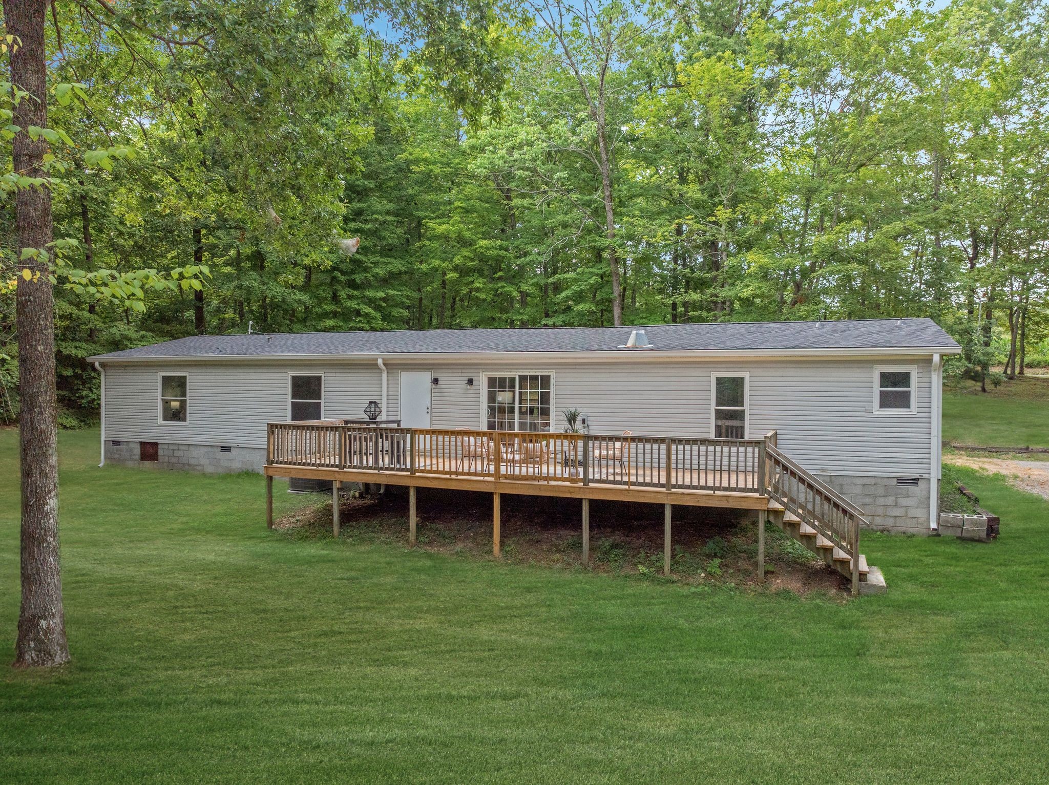 840 Promise Land Road Charlotte, TN 37036 - Photo 34 of 38 The Back Deck is a TOTAL VIBE!!!! Wonderful Outdoor Space to Relax + Unwind