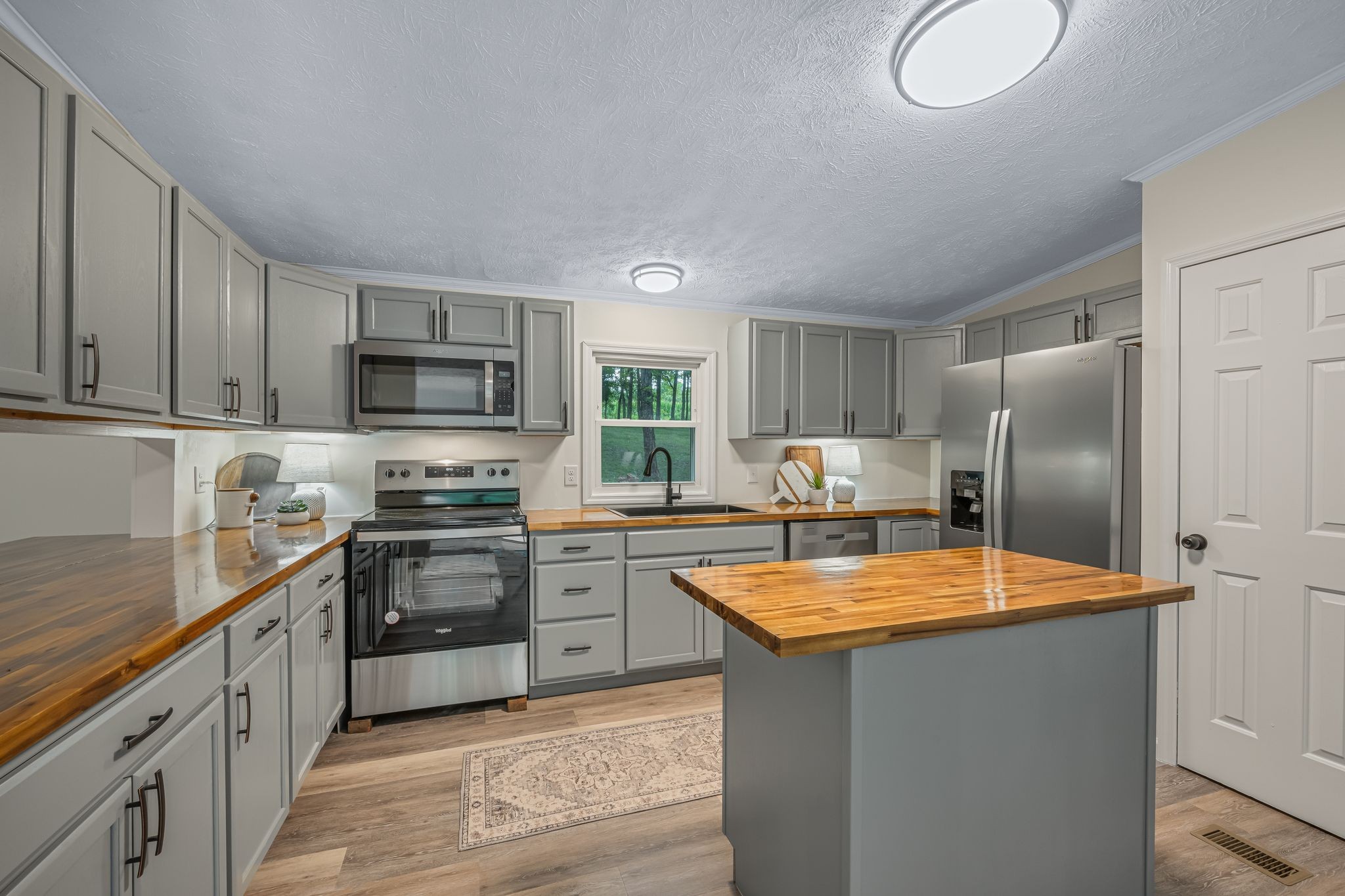 840 Promise Land Road Charlotte, TN 37036 - Photo 10 of 38 LUXE Kitchen w/ On Trend "Grey Cabinets" + Butcher Block Countertops