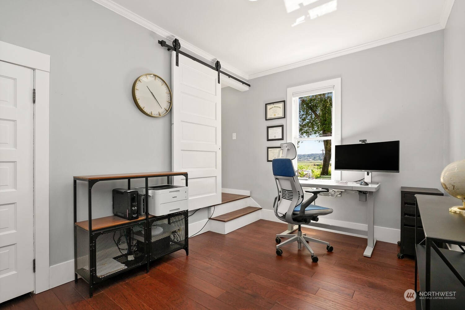 9120 Lowell Larimer Road Everett, WA 98208 - Photo 22 of 40 a view of a workspace with furniture and a window