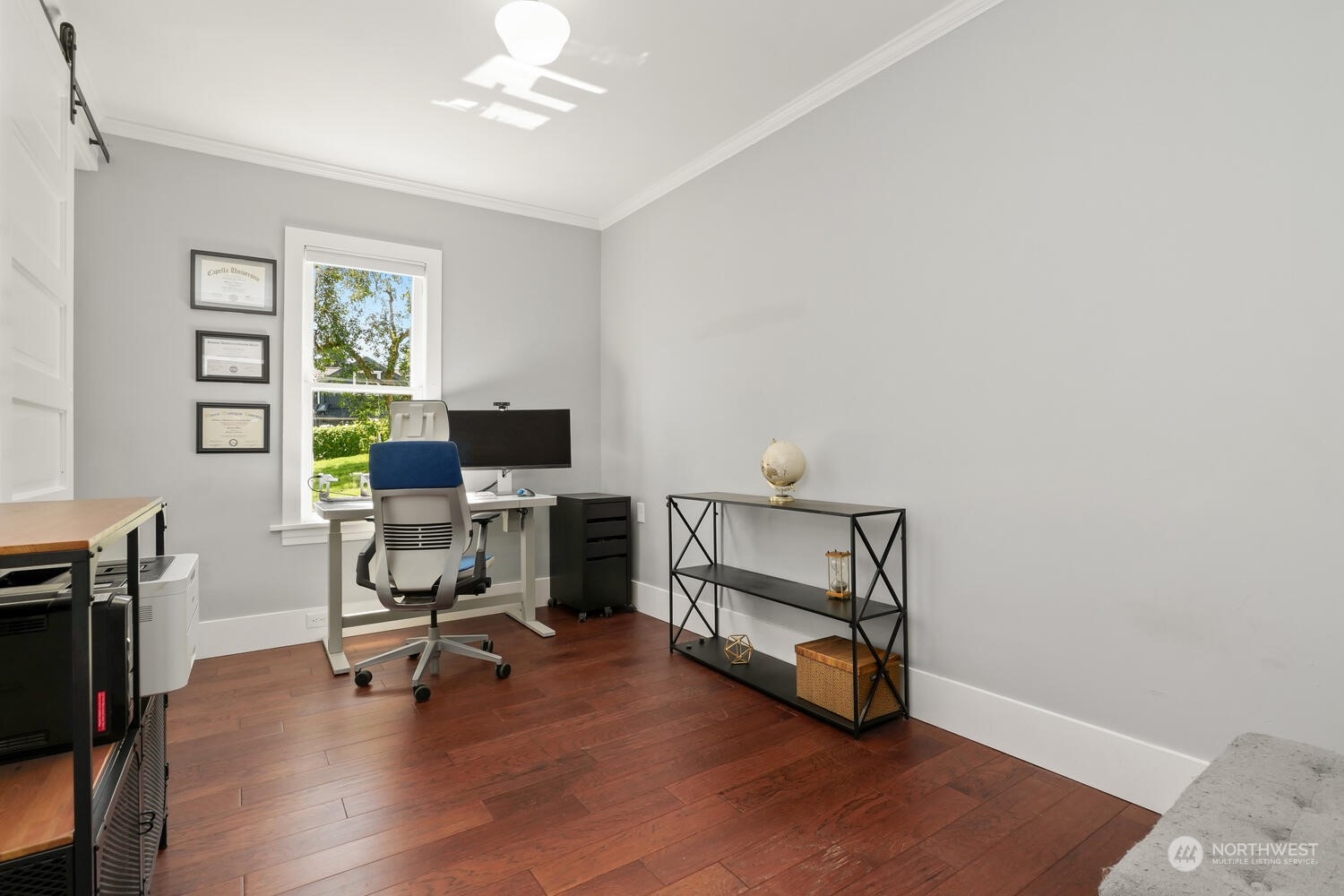 9120 Lowell Larimer Road Everett, WA 98208 - Photo 23 of 40 a view of a workspace with furniture and a window