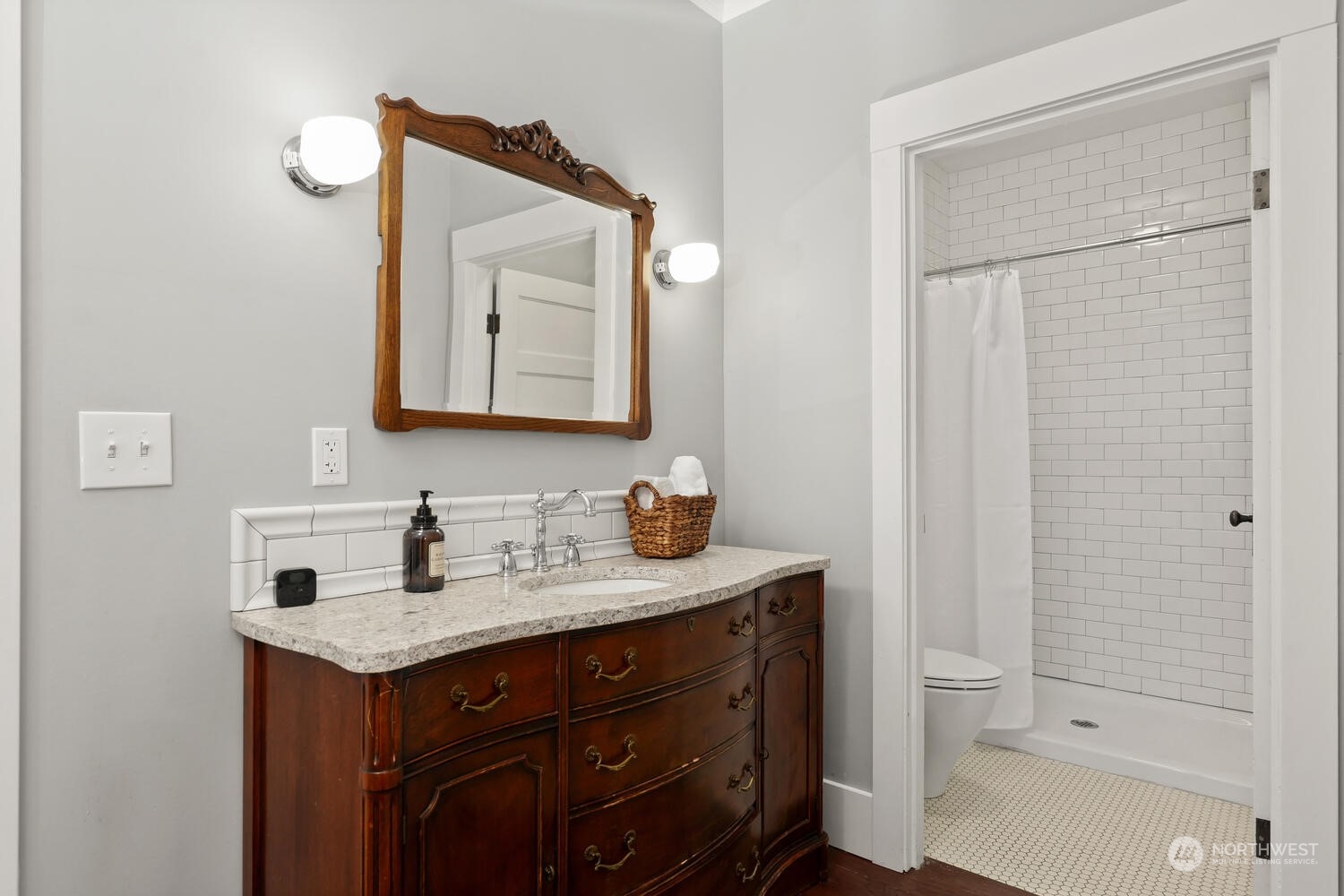9120 Lowell Larimer Road Everett, WA 98208 - Photo 24 of 40 a bathroom with a sink vanity and a mirror