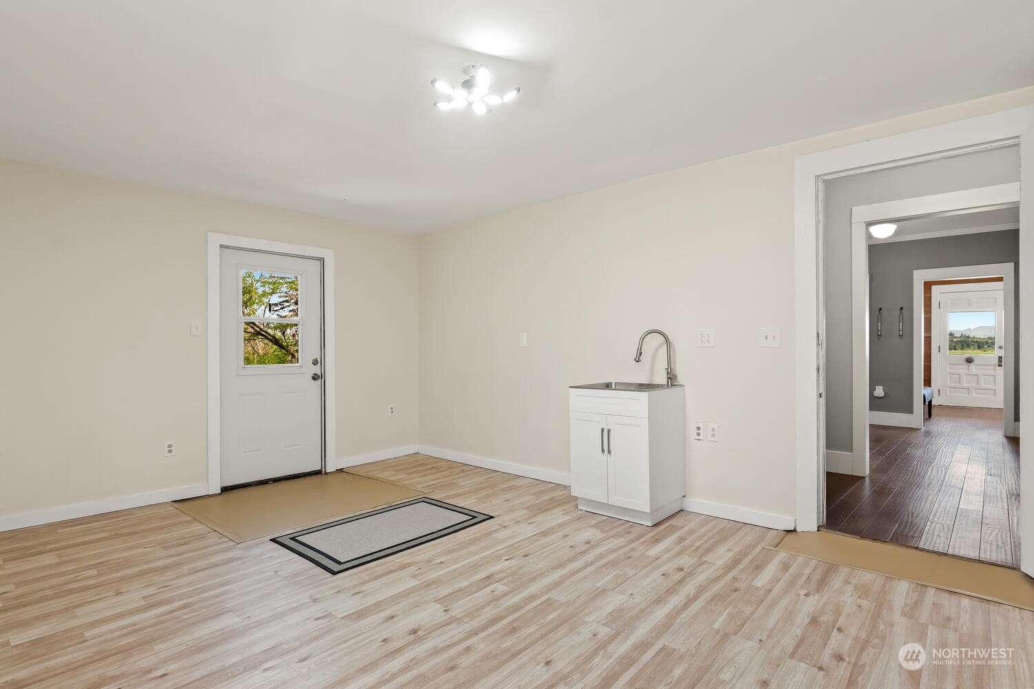 9120 Lowell Larimer Road Everett, WA 98208 - Photo 26 of 40 a view of a room with wooden floor and window