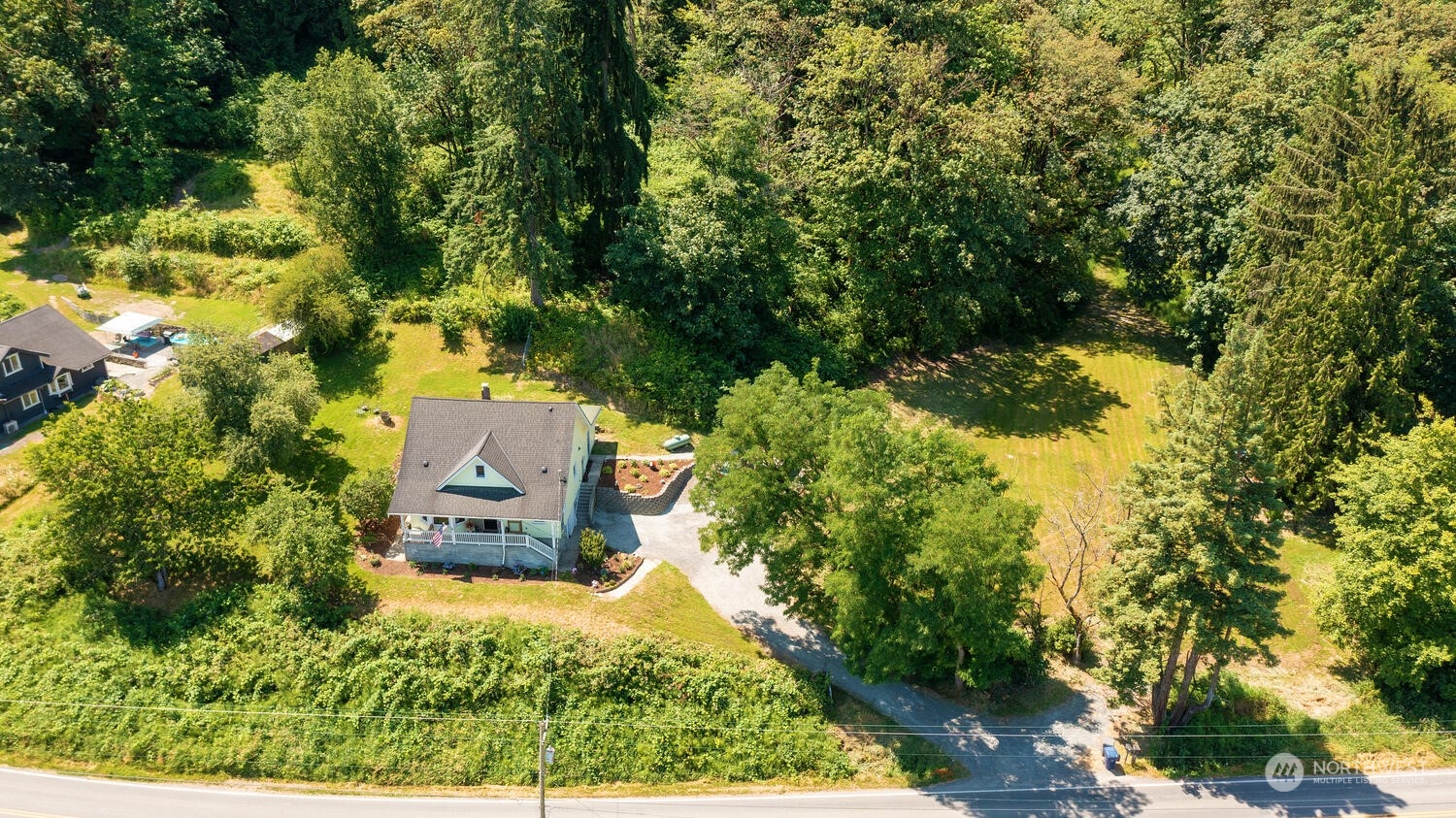 9120 Lowell Larimer Road Everett, WA 98208 - Photo 37 of 40 an aerial view of a house with yard swimming pool and outdoor seating