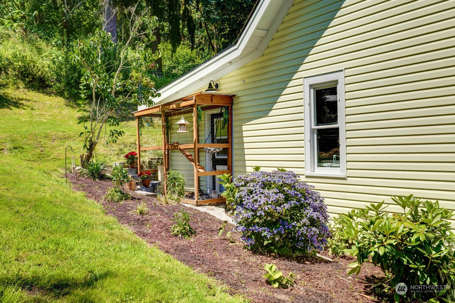 9120 Lowell Larimer Road Everett, WA 98208 - Photo 8 of 40 a view of a house with a yard and sitting area