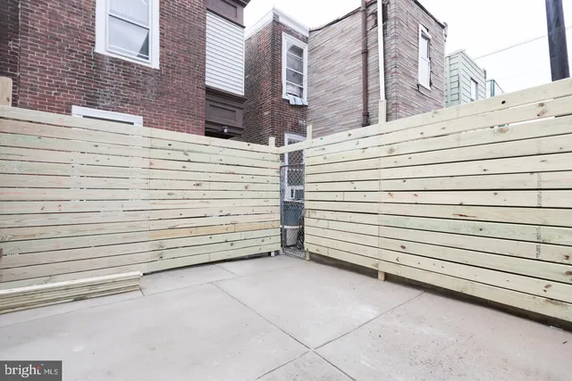 a view of a street with parking
